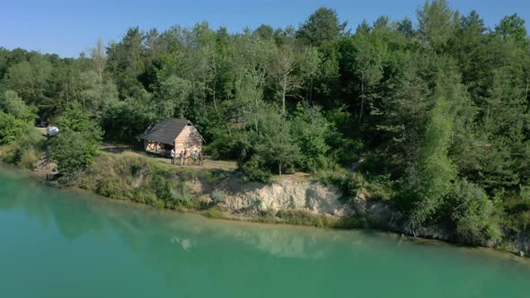 Beautiful blue-green lake in the middle of the forest, Water color of a sea wave