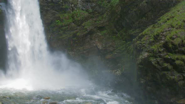 Water Drops in Waterfall Pool Going to Mossy Rocks