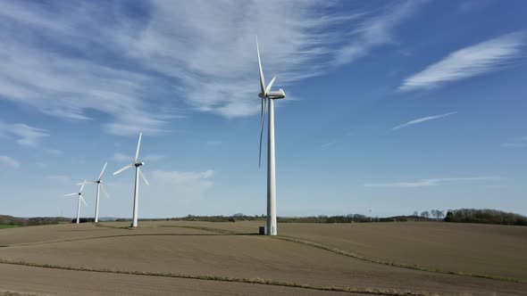 Drone Over Fields Of Wind Turbines