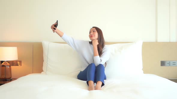 Young asian woman use smart phone