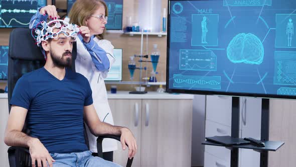 Male Patient in Modern Technology on His Head for Reading Brain Activity