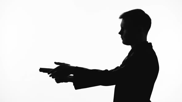 Man in Suit Pointing Gun, Threatening With Weapon, Revenge, Silhouette Side View