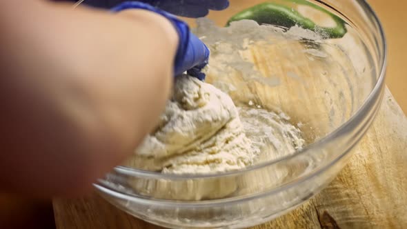 Knead the Dough with Blue Gloves