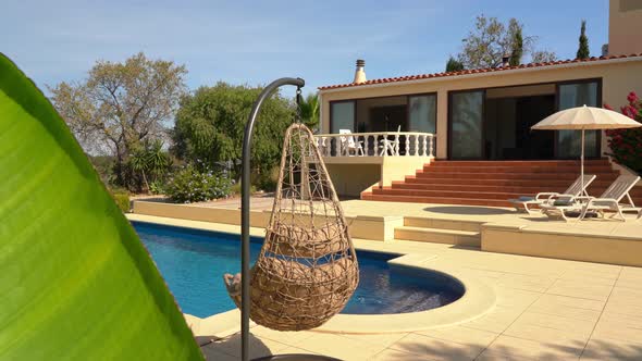 Great View of the Pool with Sun Loungers for Tourists and Clear Water