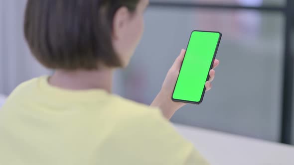 Woman Using Smartphone with Green Chroma Screen