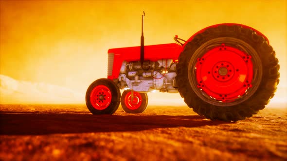 Vintage Retro Tractor on a Farm in Desert