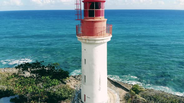 White Beacon Near Blue Sea at Summer