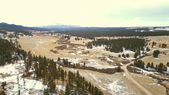 Aerial view of Pikes National Forest in the Winter.