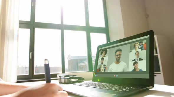 Woman with Laptop Having Video Call at Office