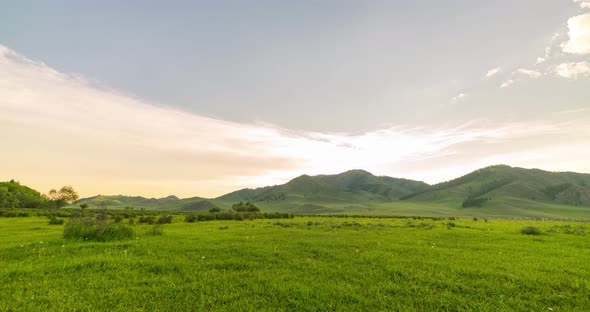 Mountain Meadow Timelapse at the Summer or Autumn Sunrise Time