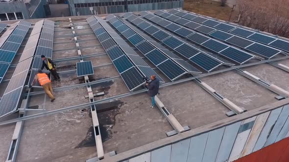 Solar photovoltaic panels. Aerial view of photovoltaic power plant on roof