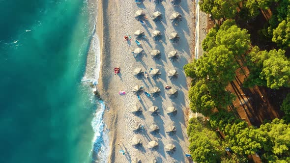 Beach and blue water. Top view from drone at the beach and blue sea. Travel and vacation