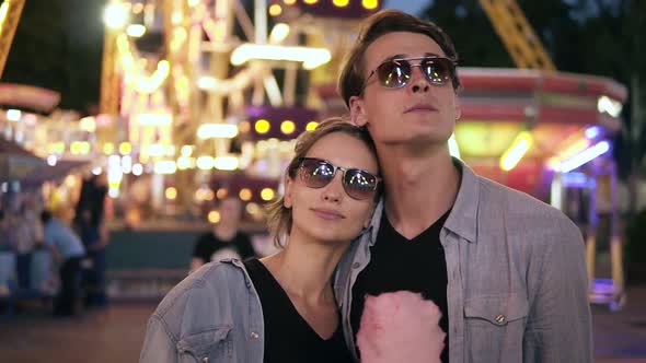 Portrait of Stylish Hipster Young Couple in Sunglasses are Standing and Looking Thoughtfully for