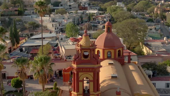 Exterior Of Saint Sebastian's Temple In Bernal, Querétaro, Mexico - aerial pullback