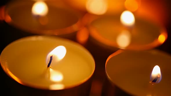 Round Candles Burning in Bedroom, Romantic and Intimate Atmosphere, Close-Up