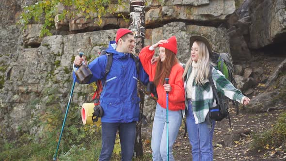 Group of Young People Going at Cave or Mountain Trip