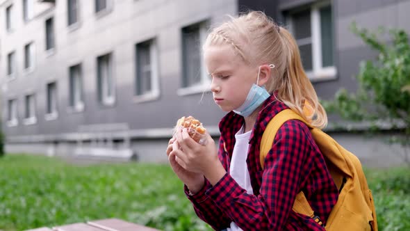 Back to School Girl Wearing Mask and Backpacks Protect and Safety From Coronavirus