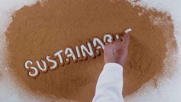 Hand Writes On Soil  Sustainable