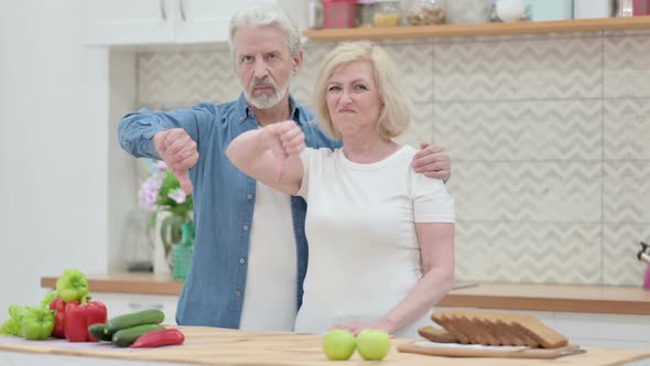 Old Couple Showing Thumbs Up Sign