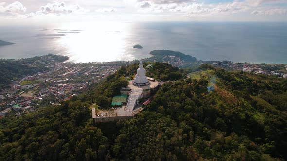 Aerial View of White Big Buddha Statue Temple on Hilltop Overall Drone Shot