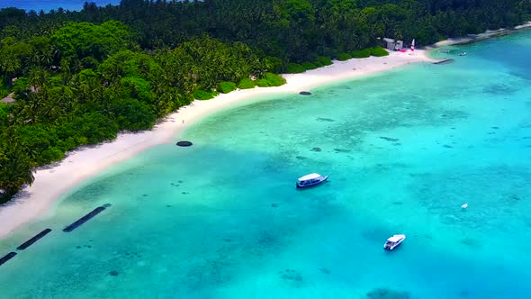 Aerial drone sky of shore beach by water with sand background