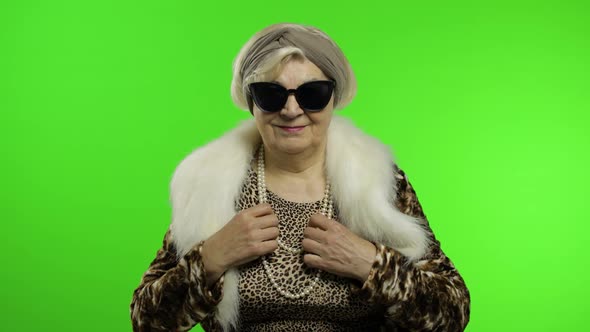 Elderly Stylish Grandmother. Caucasian Woman Posing on Chroma Key Background