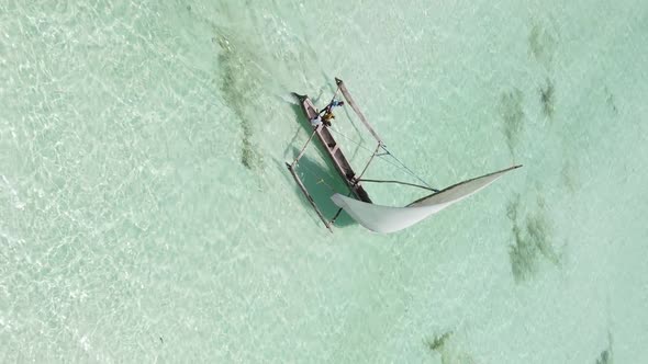 Vertical Video Boats in the Ocean Near the Coast of Zanzibar Tanzania Aerial View