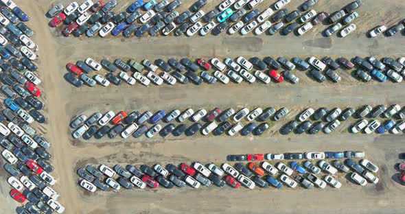 Rows a many used cars parking auction lot terminal parked