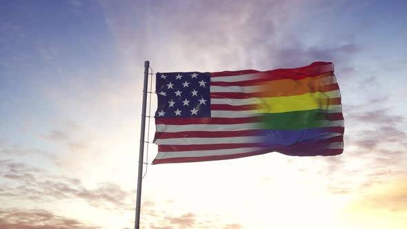 Waving national flag of USA and LGBT rainbow flag background