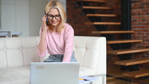 A Middleaged Woman in the Home Office