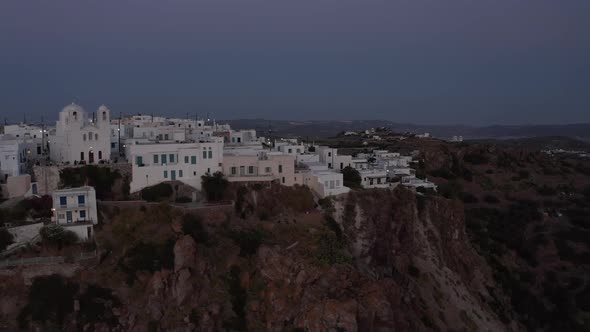 Little Village on a Mountain Site After Sunset with White Houses, Aerial View