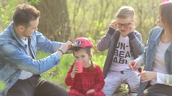 Young family with children having fun in nature