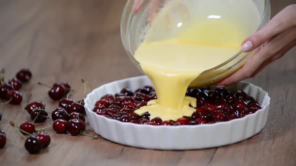 Cooking the clafoutis with cherry