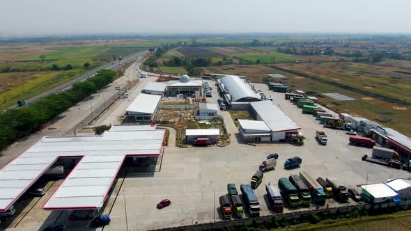 Fuel station and rest place for drivers on highway in Cikampek, Java, Indonesia, aerial view