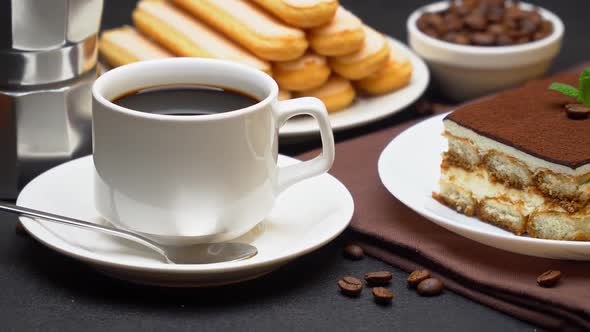 Portion of Traditional Italian Tiramisu Dessert Cup of Espresso Mocha and Coffee Beans