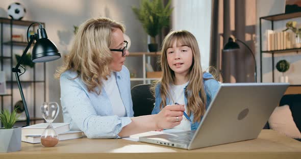 Mother Argues with Her Smart Able Teen Daughter During Doing School Tasks