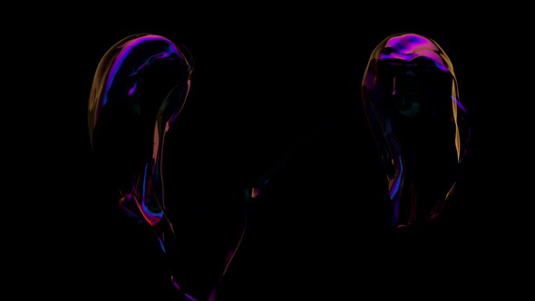 Soap Bubble Heart floating in dark room