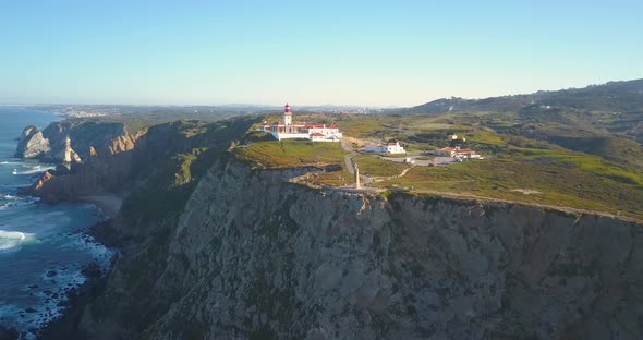 aerial shot around of Cliffs at Cabo da Roca (Cape Roca) in Portugal that forms the westernmost main