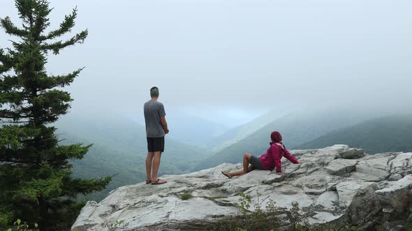 A man and woman at the Rohrbaugh Cliffs in the Dolly Sods Wilderness, part of the Monongahela Nation