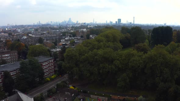 Beautiful Aerial View of London with Many Green Parks and City Skyscrapers