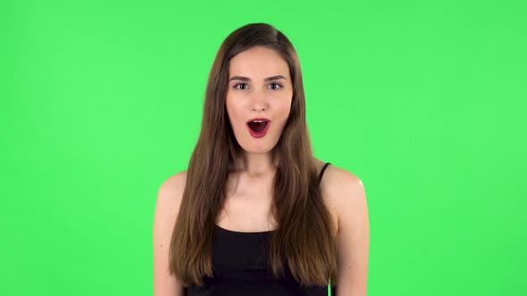 Girl Says Wow with Smile. Green Screen