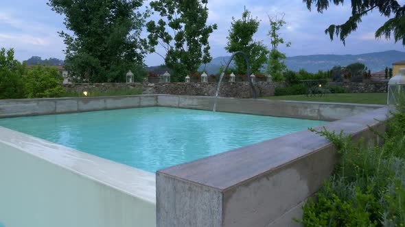 A pool and spa hot tub at a luxury resort in Italy, Europe.