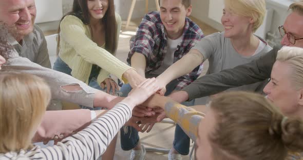 College Students Teamwork Join Hands Partnership Concept