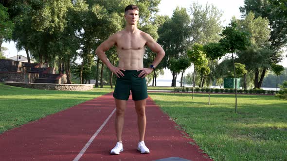 Young Muscular Man in Sportswear Relax After Training Outdoor Workout