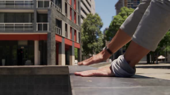 Caucasian man practicing parkour