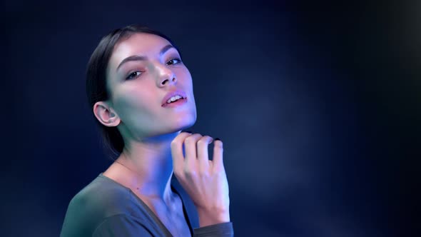 Closeup Portrait Fashionable Asian Brunette Woman Flirting Posing Isolated Neon Light Black Studio