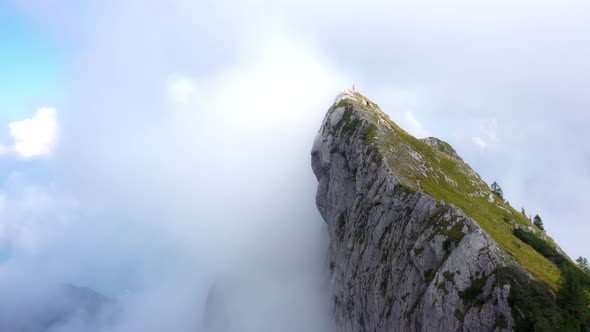 huge mountain covered in fog in austria