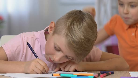 Boy Painting, Younger Sister Scaring Brother, Happy Childhood Siblings Relations