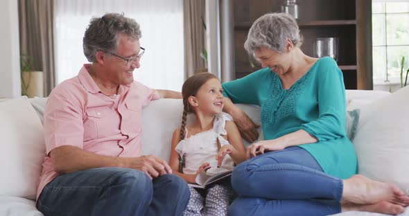 Grandparents and granddaughter spending time together