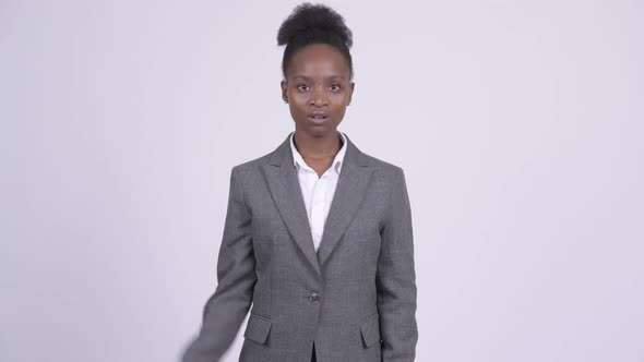 Young Angry African Businesswoman Giving Thumbs Down